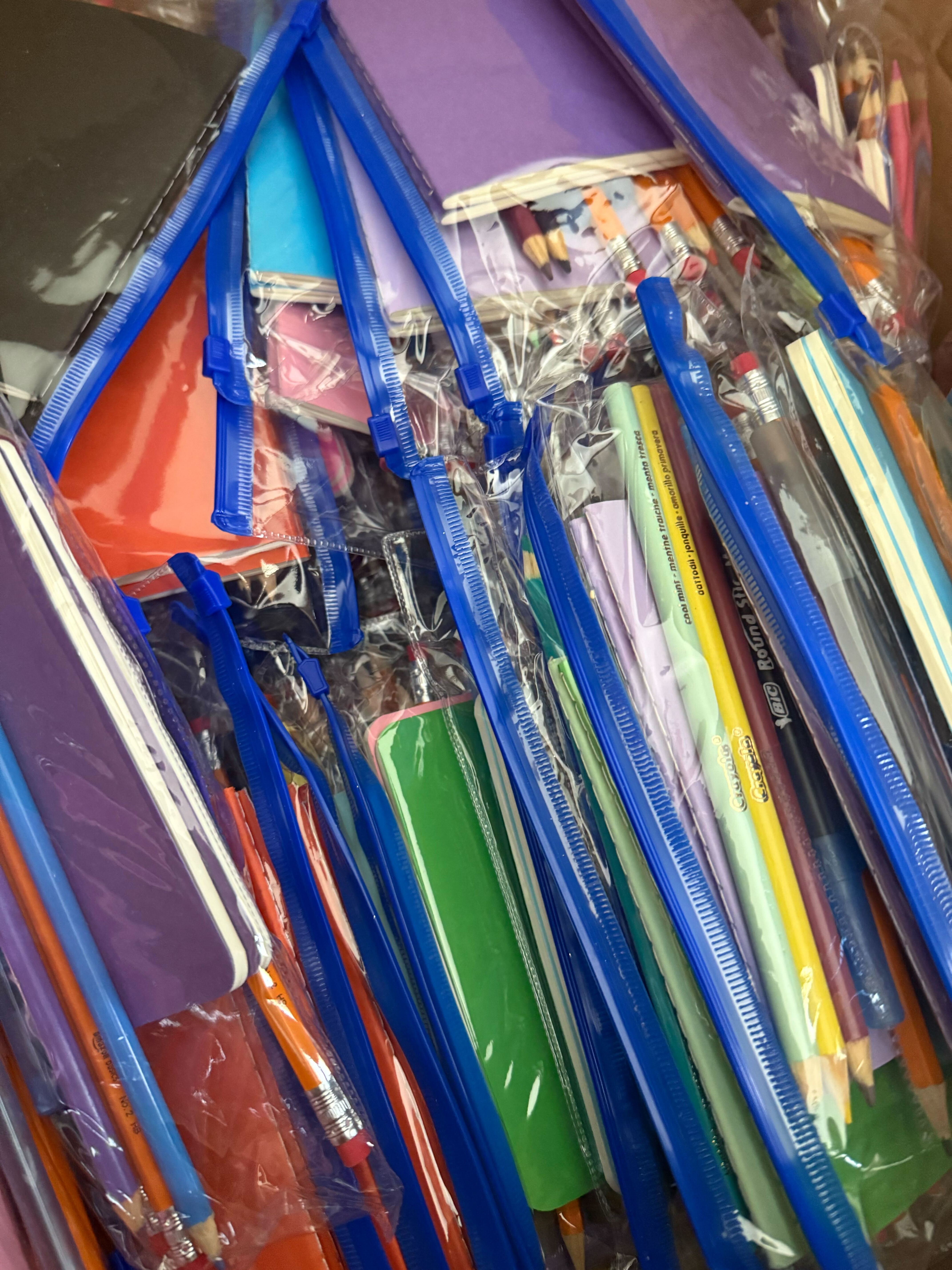 Purple school supplies donations